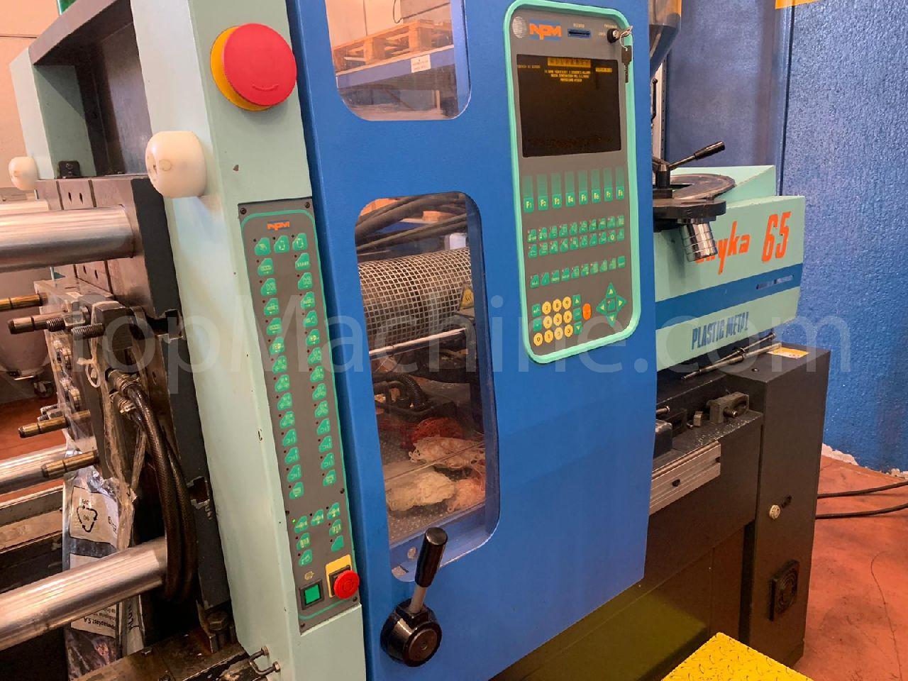 Used Npm unyka 65 Injection Moulding Clamping force up to 1000 T
