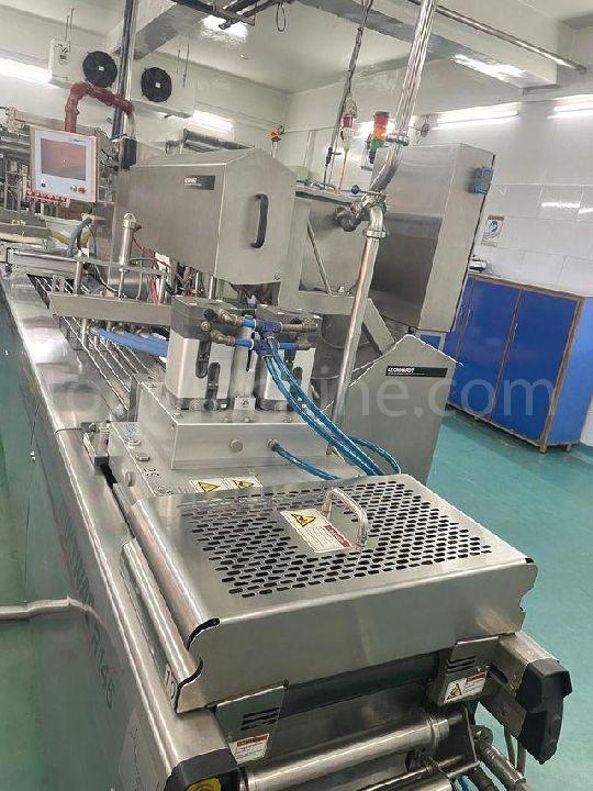Used Multivac R145  Llenado y sellado de vasos